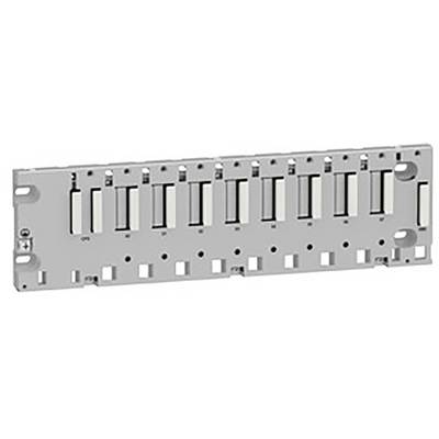Un support métallique gris avec plusieurs découpes rectangulaires et trous de fixation, utilisé pour le montage dans des dispositifs techniques.