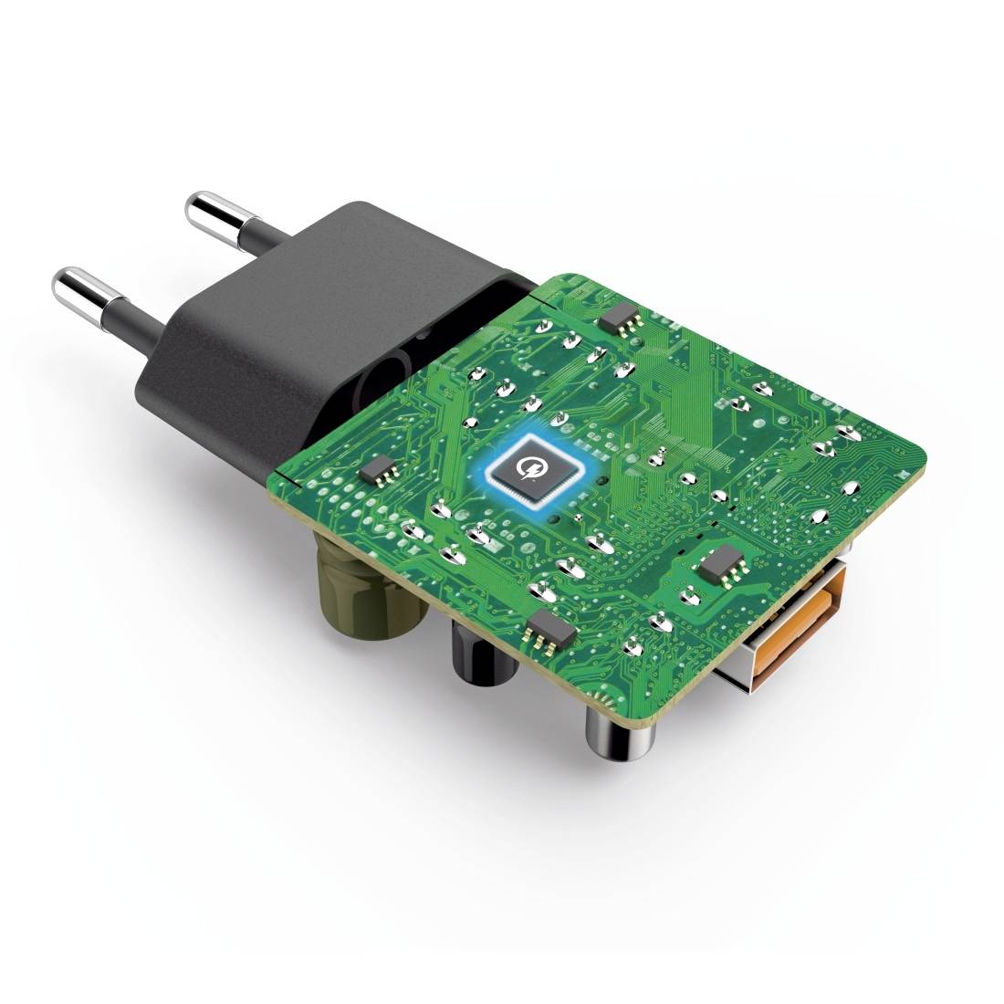 'Une prise de chargeur ouverte avec un circuit imprimé vert visible et ses composants.'