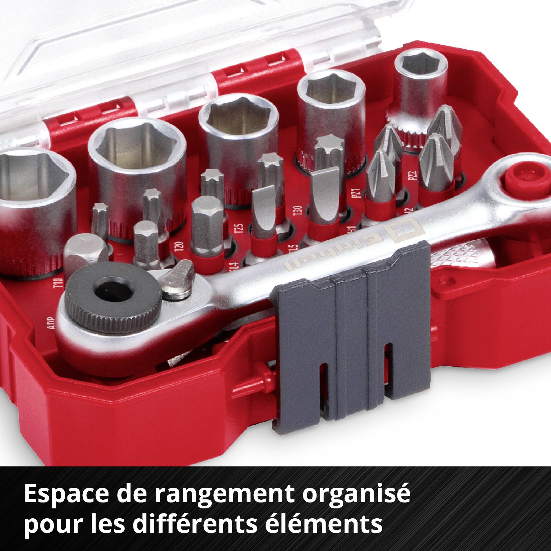 Une boîte rouge contenant différents embouts de tournevis et une clé à molette. Texte : 'Espace de rangement organisé pour les différents composants'.
