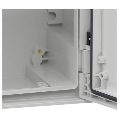 « Image d'un boîtier électrique ouvert, montrant un intérieur aux surfaces lisses et des options de fixation pour les accessoires. »