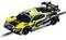 Une voiture de course au design jaune et noir, arborant divers logos, dont 'Skechers', sur un circuit de course.