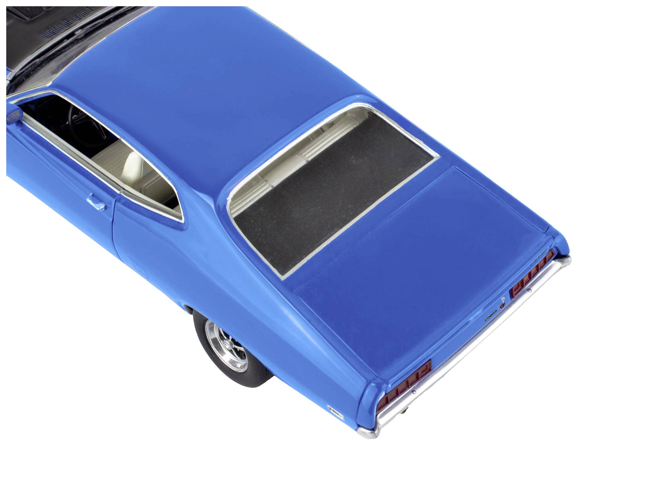 Voiture bleue vue de dessus, toit et lunette arrière visibles, sur fond blanc.