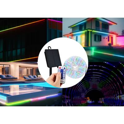 Des bandes lumineuses LED télécommandées ornent une maison et un jardin la nuit, créant un éclairage décoratif et coloré.