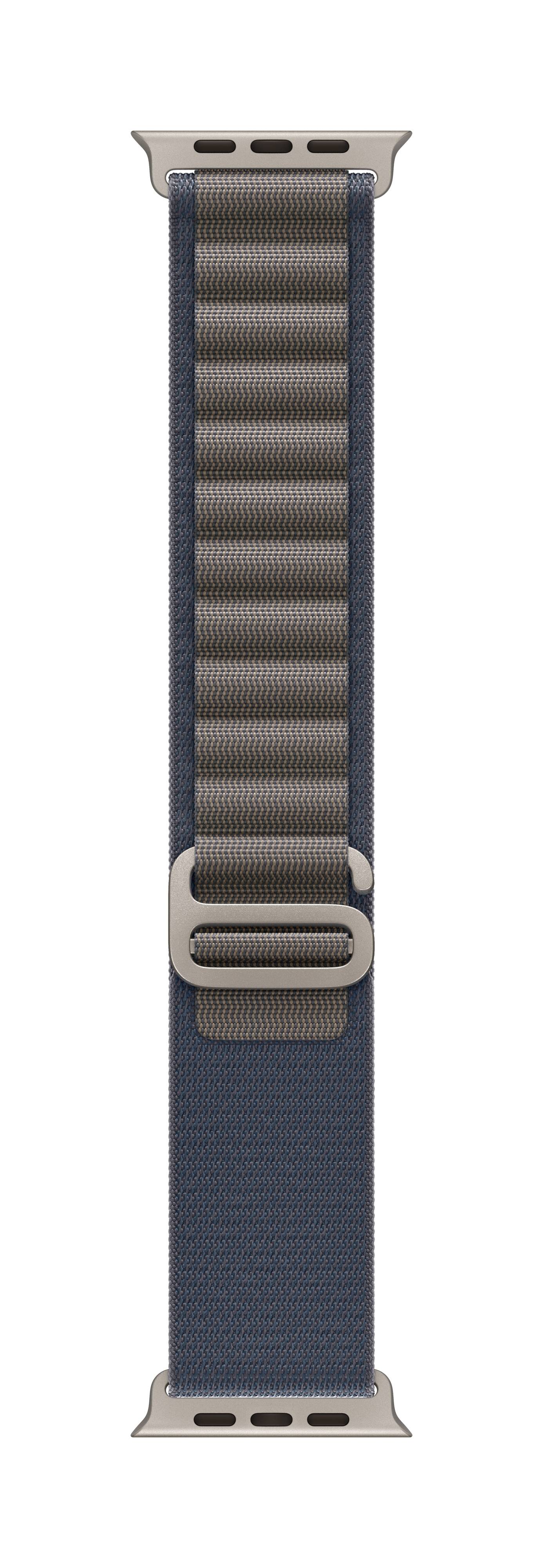 Bracelet de montre en tissu bleu marine avec boucle métallique, orienté verticalement.