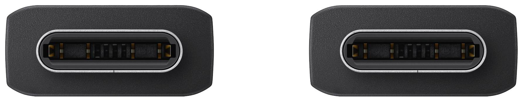 Deux ports USB noirs côte à côte sur un appareil noir.