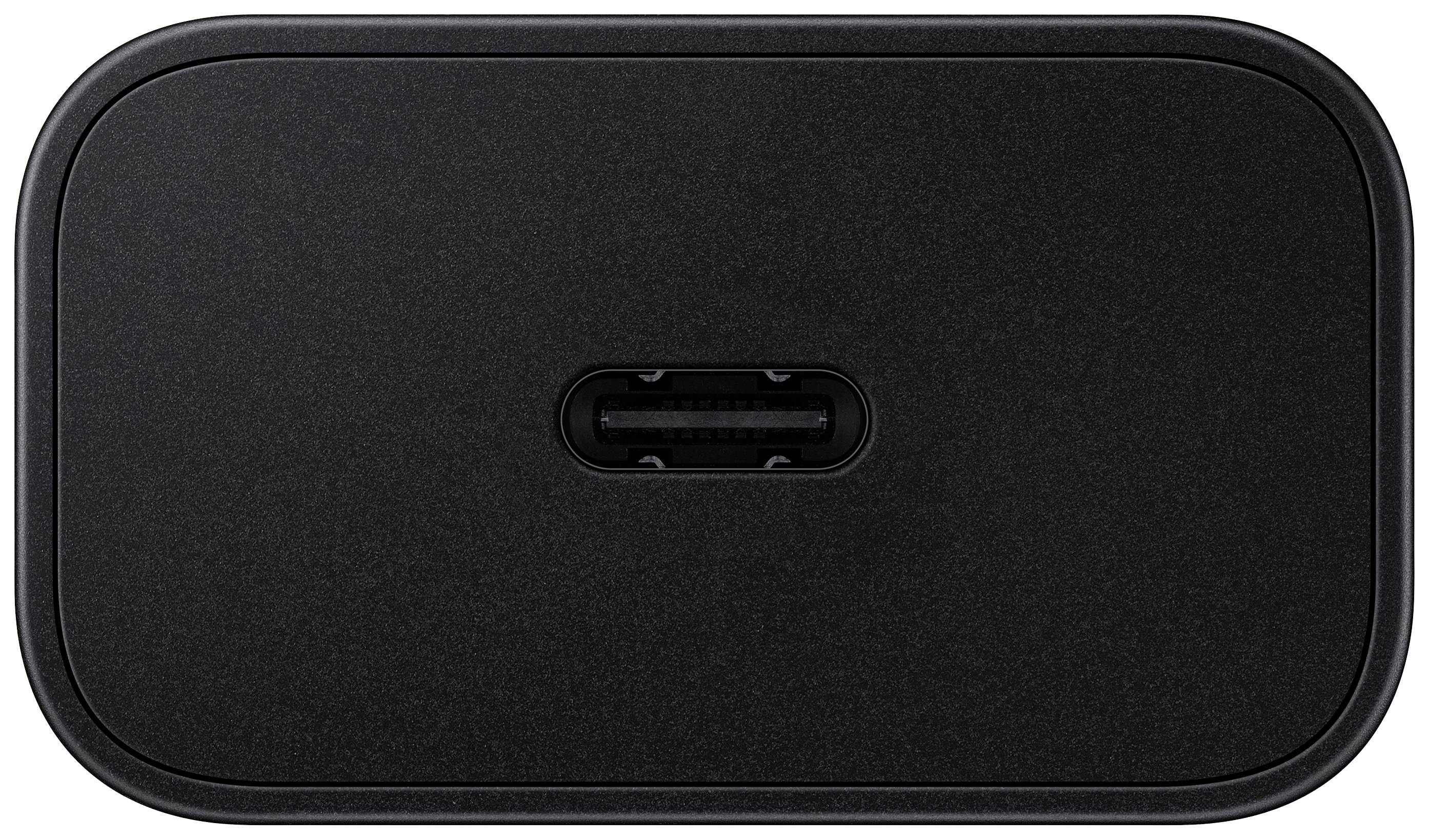 Un chargeur noir, rectangulaire avec des coins arrondis et un port USB-C central.