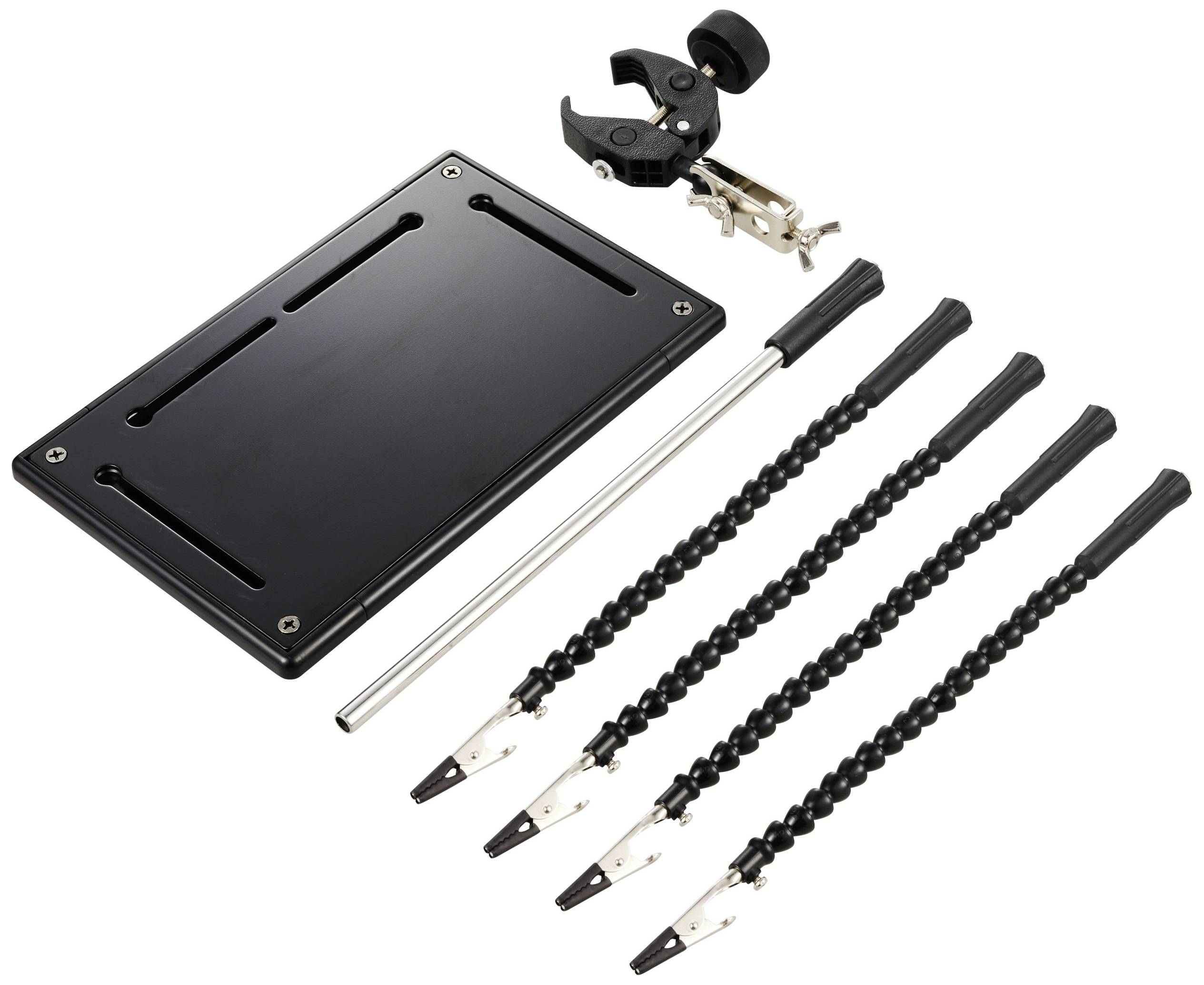 L'image montre un poste de soudure avec des bras flexibles et des pinces pour maintenir les pièces, parfait pour des travaux de précision.