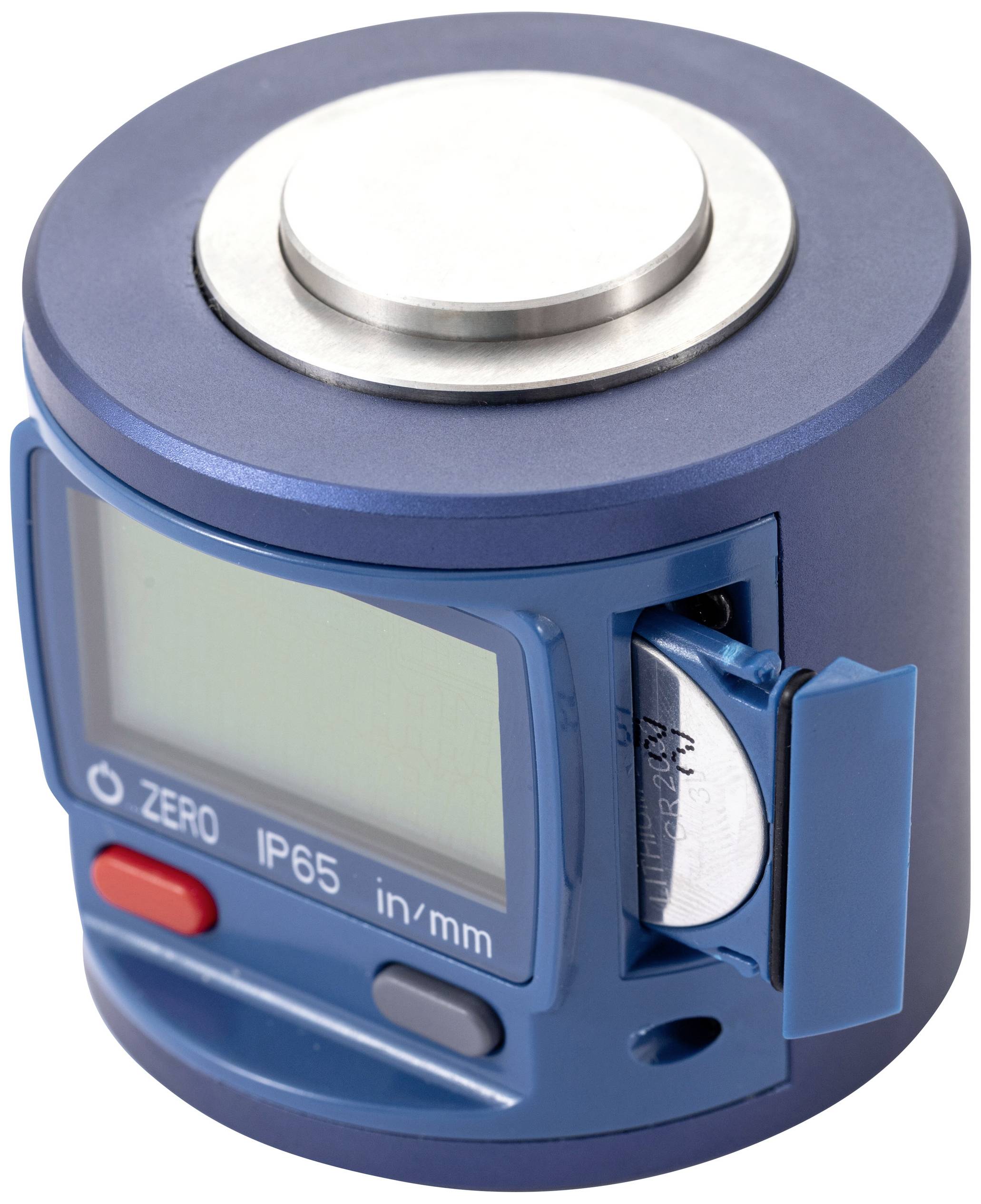 Un appareil de mesure numérique portable avec un écran et un compartiment à piles. Il affiche des valeurs et des fonctions, protégé contre la poussière et l'eau selon la norme IP65.