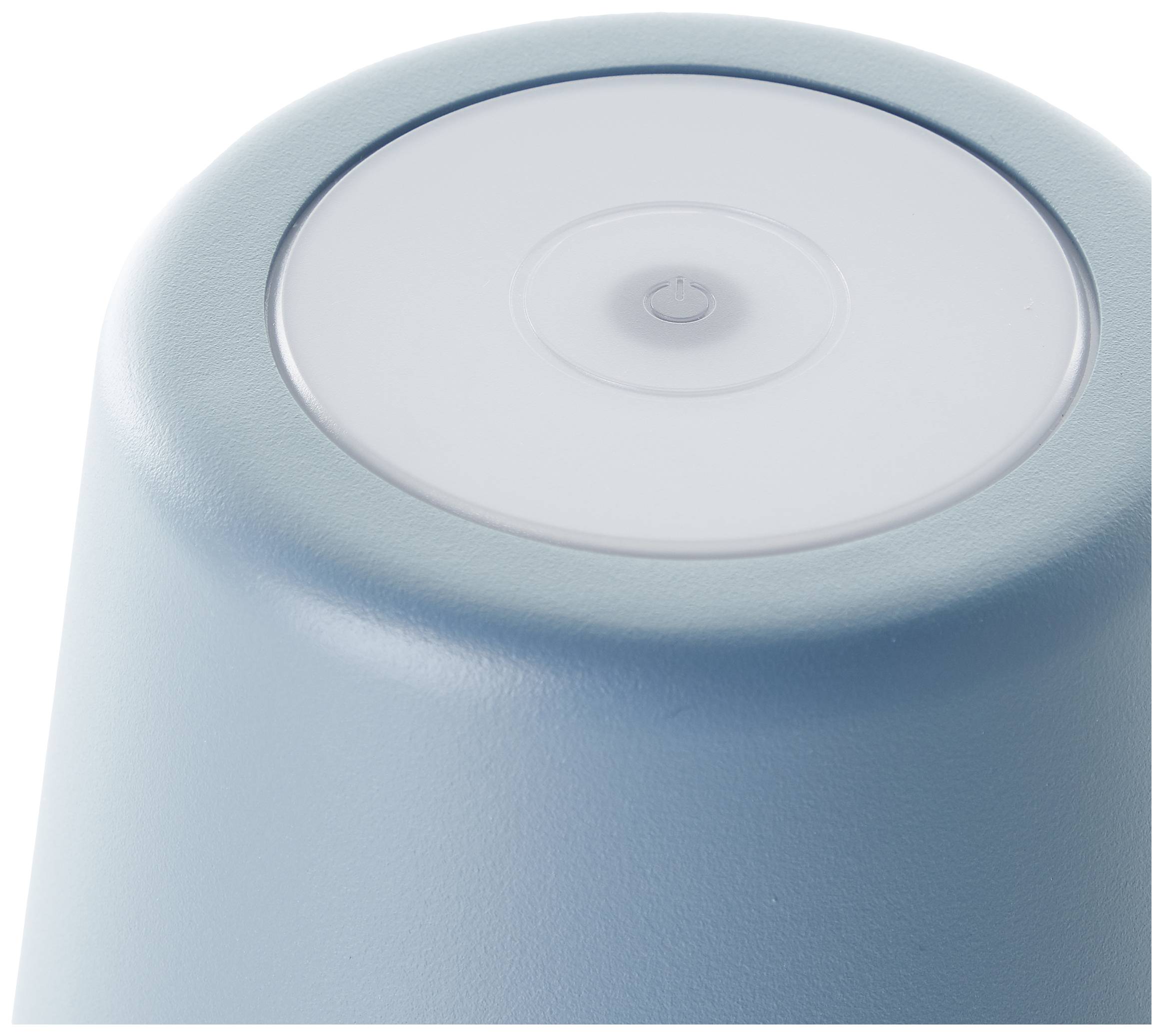Un gobelet bleu à l'envers avec un couvercle blanc et rond, portant un symbole de mise en marche central.