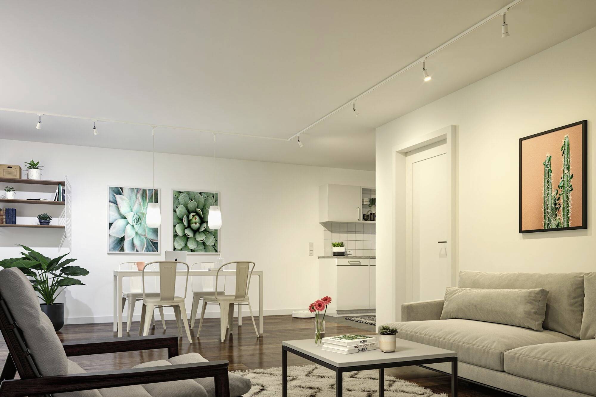 Salon avec des meubles modernes, canapés et fauteuils. Une table à manger et une cuisine ouverte en arrière-plan. Murs décorés avec des images de plantes.