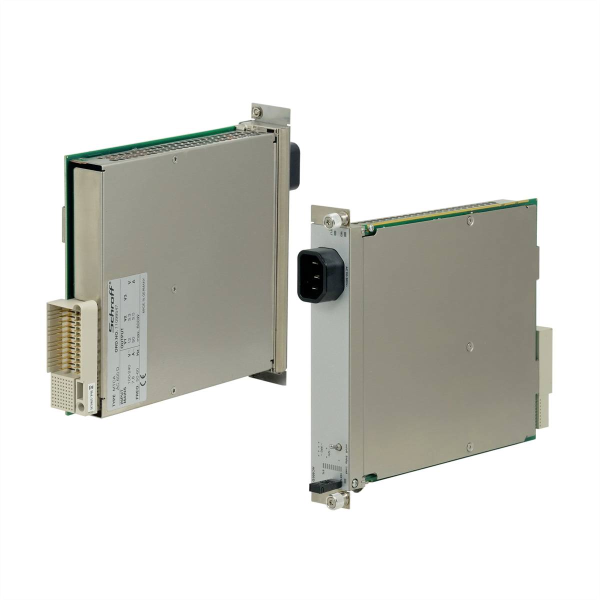 Deux modules électroniques avec boîtiers métalliques et connexions enfichables, qui sont probablement des composants d'un dispositif ou système technique.