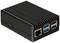 Un ordinateur monocarte noir avec plusieurs ports USB, un port Ethernet et un design à ailettes de refroidissement sur le côté.