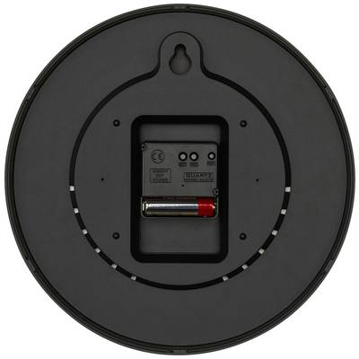 Face arrière ronde d'une horloge murale avec un compartiment à pile contenant une pile AA. Montre le mécanisme à quartz et le dispositif de suspension.