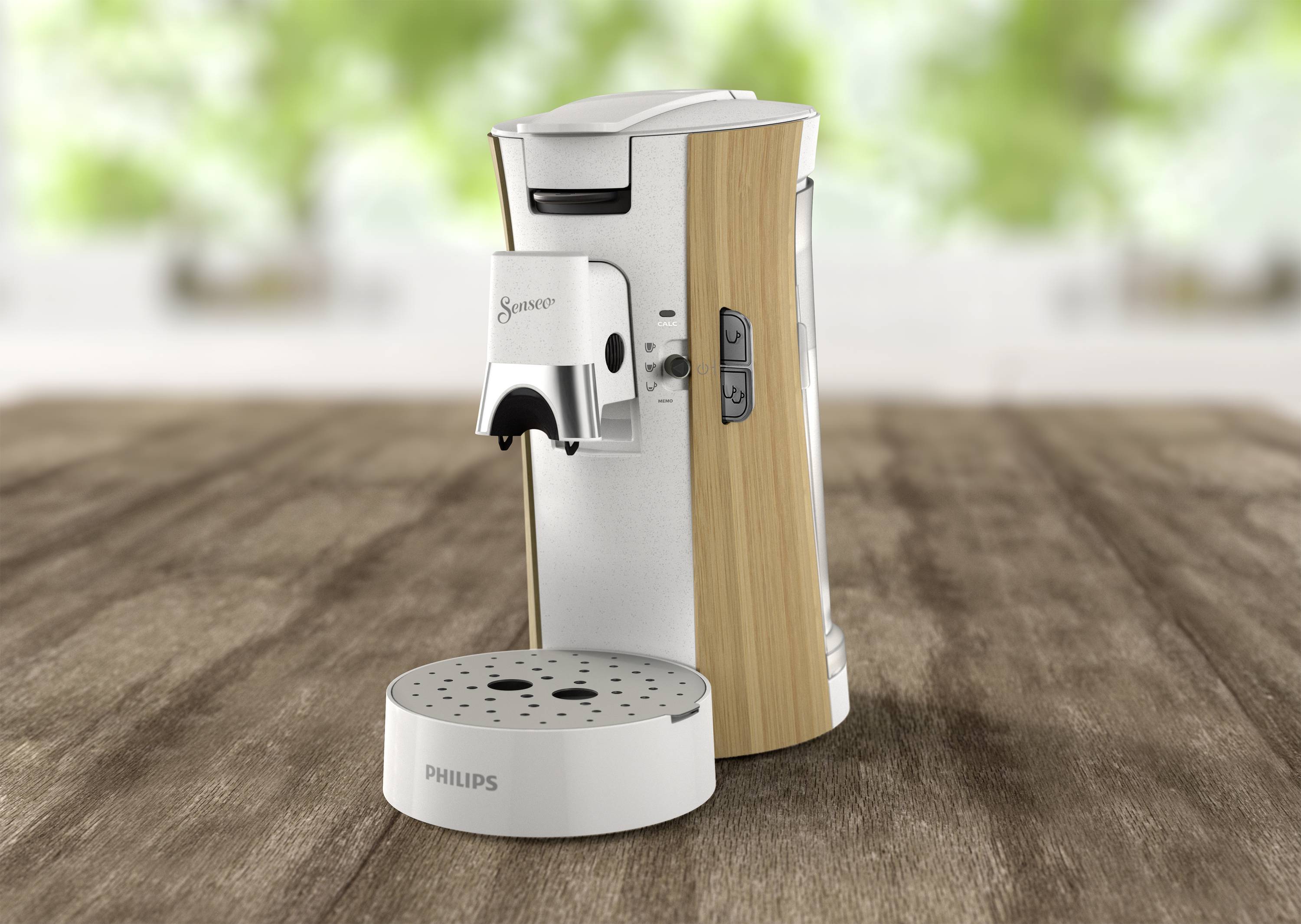 Machine à espresso sur une table en bois, au design élégant et à la finition en bois, adaptée à une utilisation domestique.