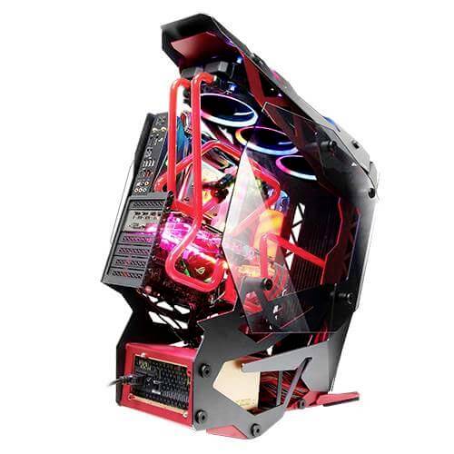 Ordinateur de gaming au design futuriste avec des composants lumineux visibles. Couleurs dominantes : rouge et noir.