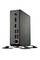 Mini-PC compact noir avec des ports, notamment HDMI, USB et Ethernet, posé verticalement sur un support.