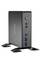 Mini-PC compact noir avec plusieurs ports sur la façade, dont des ports USB, des entrées audio et un bouton marche/arrêt.