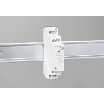 Un relais électrique est monté sur un rail métallique, avec plusieurs bornes marquées pour le câblage.