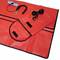 Étui de protection rouge, rectangulaire, avec plusieurs compartiments, contenant un câble spiralé noir avec une pince et divers accessoires.