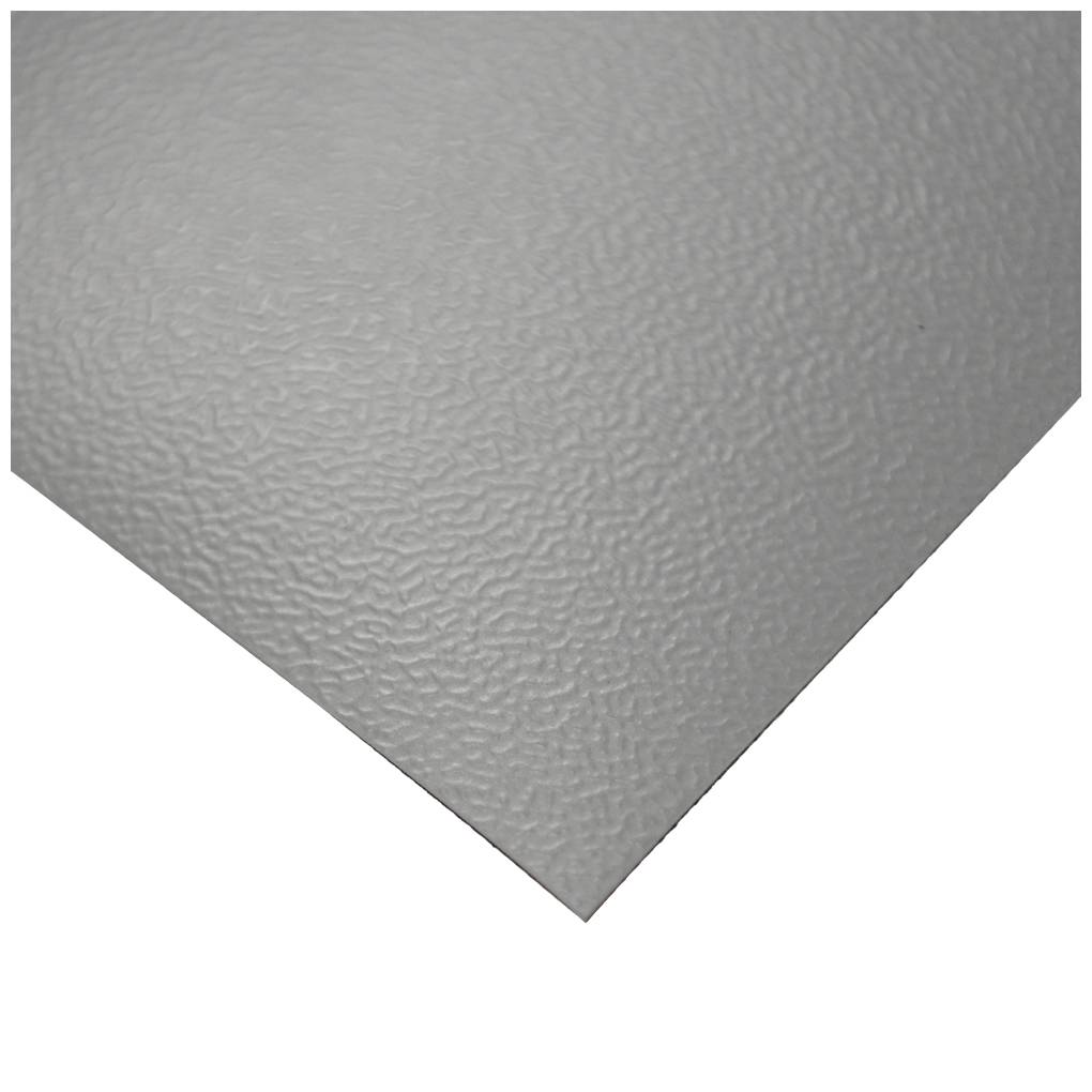 Surface structurée grise, légèrement brillante et ondulée.