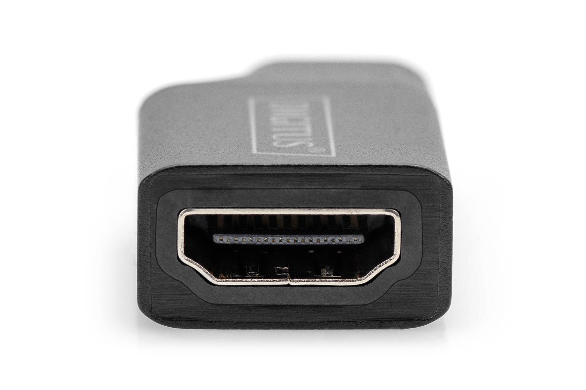 Un adaptateur HDMI noir avec une ouverture de connexion visible, utilisée pour brancher des câbles HDMI.