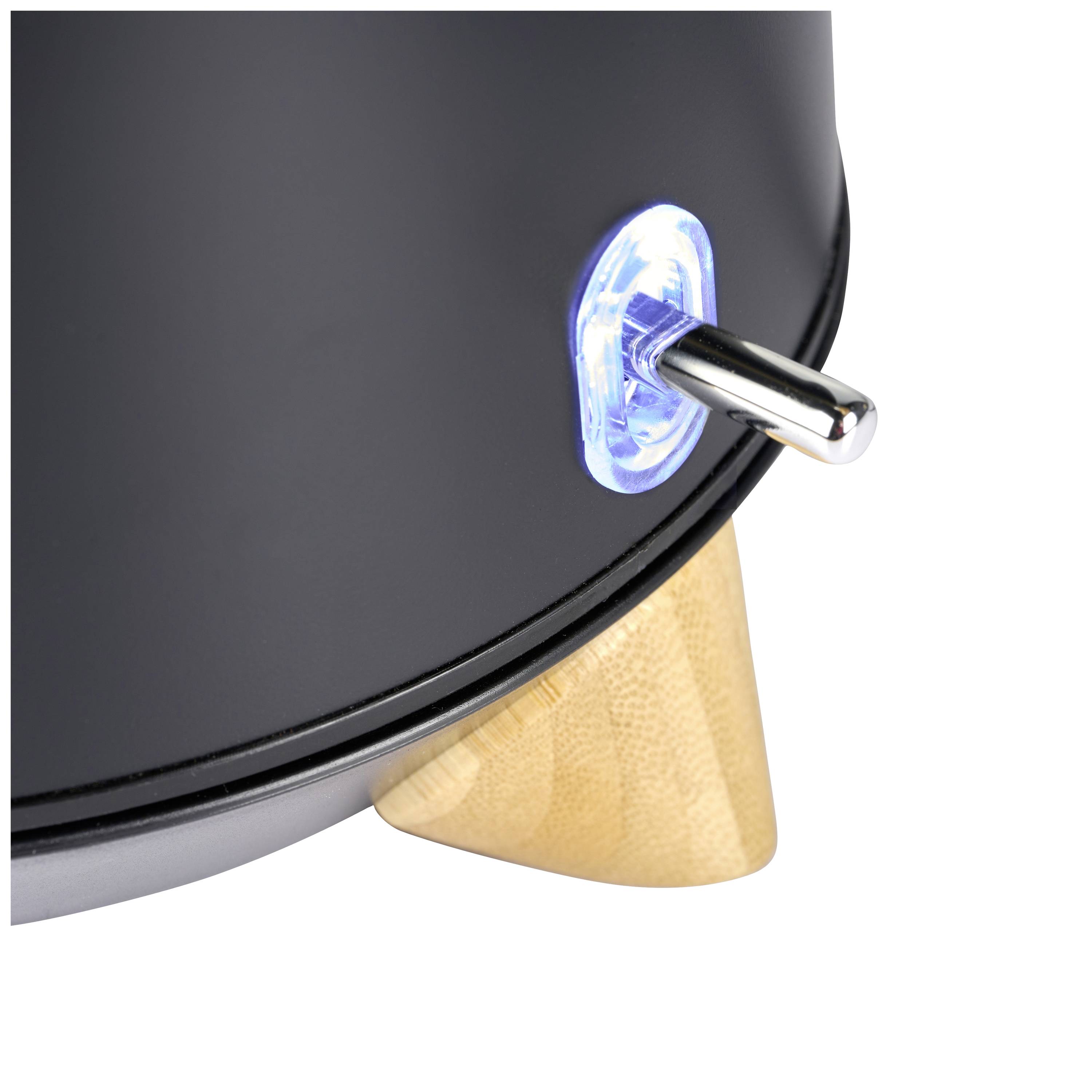 Détail d'un appareil avec un interrupteur bleu lumineux et un pied en bois. L'interrupteur est en position marche et témoigne d'une technologie moderne.