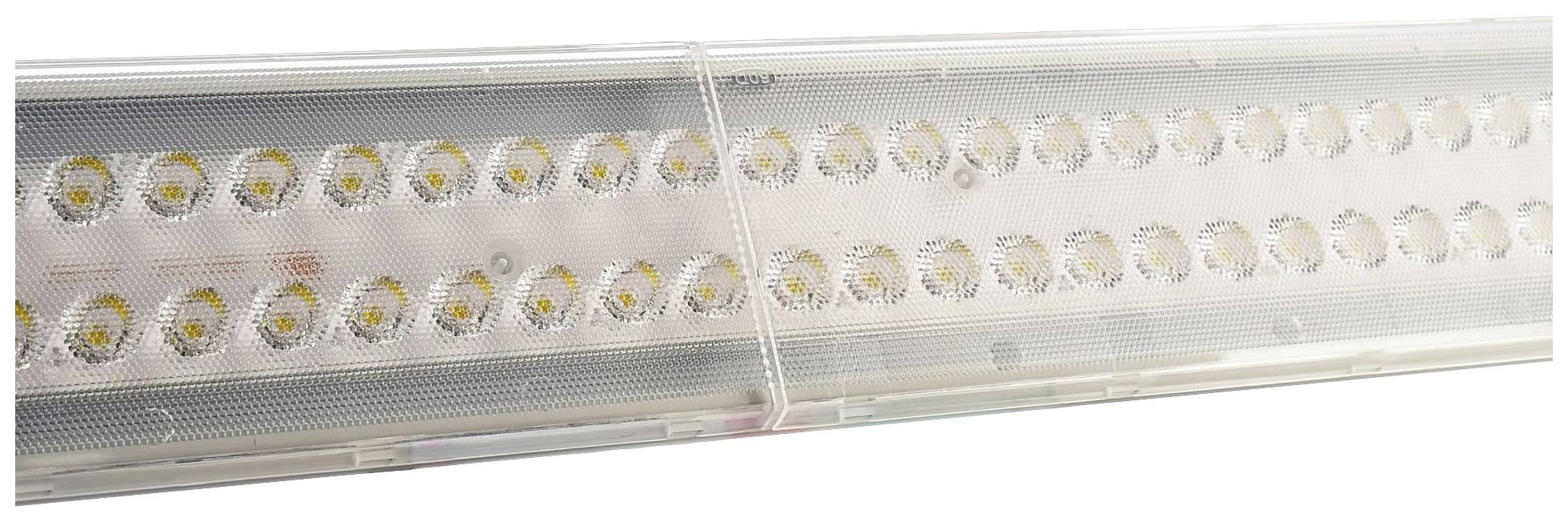Une barre lumineuse à LED avec plusieurs rangées de petites lumières circulaires.