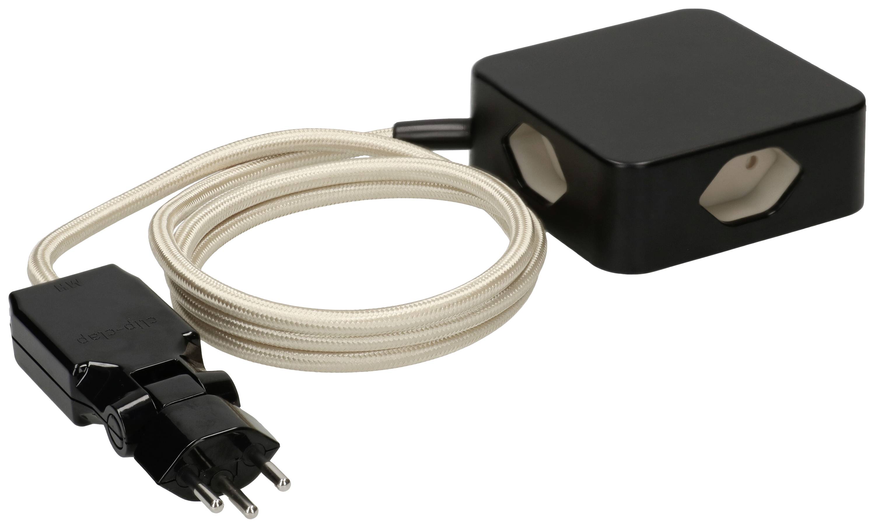 'Boîtier noir avec deux prises et câble beige. Prise suisse à trois broches, adaptée pour la connexion d'appareils électriques.'