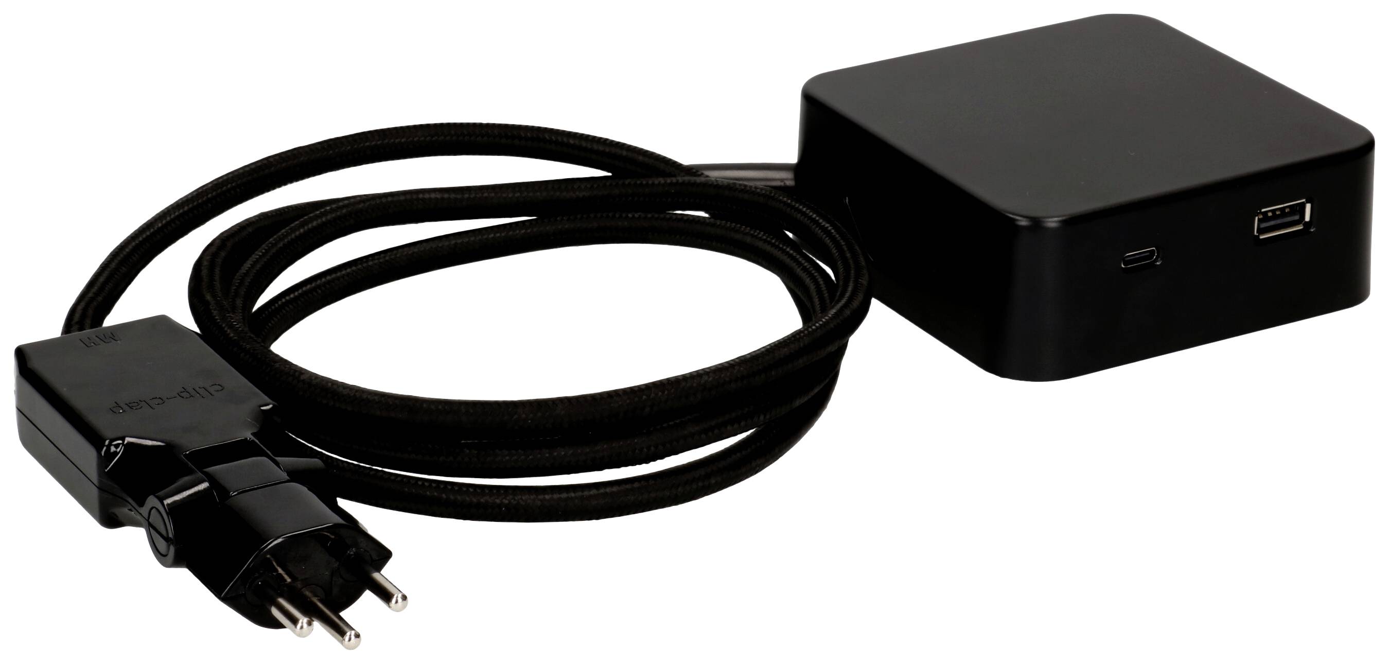 Chargeur noir avec ports USB et micro-USB, connecté à un câble secteur noir avec fiche européenne.