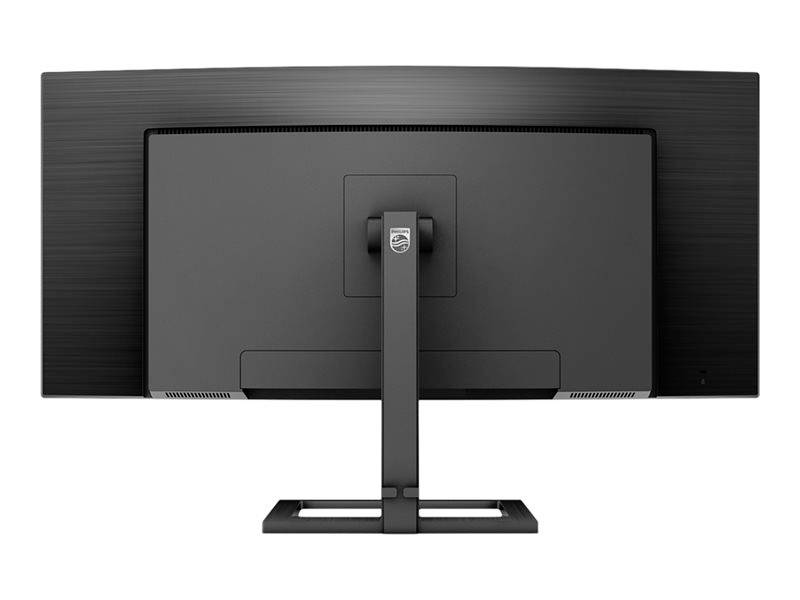 Vue arrière d'un moniteur d'ordinateur noir sur un socle. L'écran est éteint et présente une surface mate.