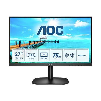 Un moniteur informatique AOC de 27 pouces. Caractéristiques affichées : Panneau VA, résolution Full HD, 75 Hz, HDMI. En arrière-plan, une jetée donnant sur la mer.