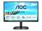 Un moniteur informatique AOC de 27 pouces. Caractéristiques affichées : Panneau VA, résolution Full HD, 75 Hz, HDMI. En arrière-plan, une jetée donnant sur la mer.