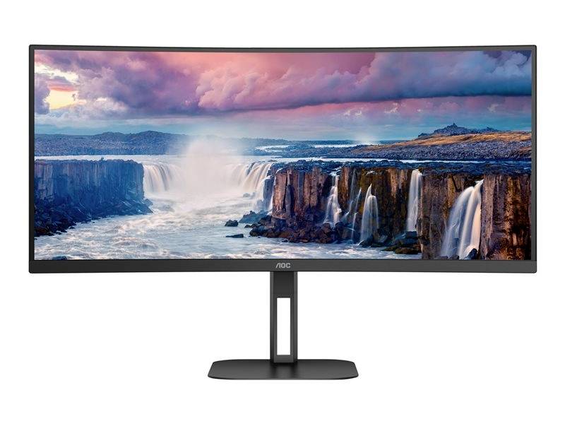 Un large écran affiche une cascade sous un ciel dramatique. Idéal pour les expériences visuelles et le travail productif.
