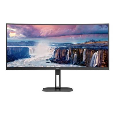 Un large écran affiche une cascade sous un ciel dramatique. Idéal pour les expériences visuelles et le travail productif.