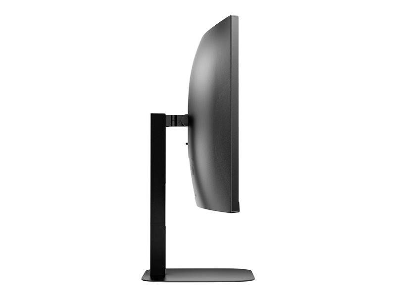 Vue latérale d'un écran d'ordinateur moderne au design élégant, posé sur un support noir.