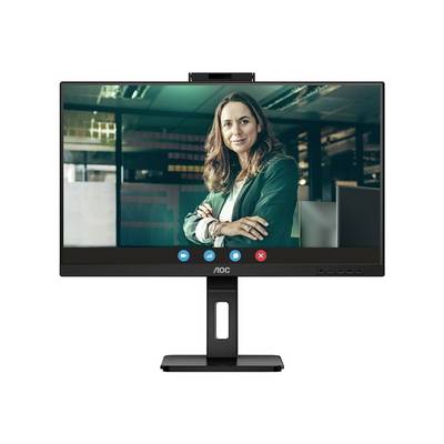 Femme sur un moniteur lors d'une réunion virtuelle. Elle sourit et porte un blazer vert. Des icônes de microphone et de caméra sont visibles.