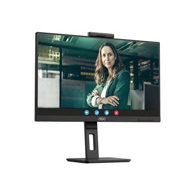 Sur un écran de moniteur, un écran de visioconférence affiche une personne souriant amicalement, dans un environnement de bureau.