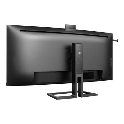 Vue arrière d'un grand écran d'ordinateur noir avec un support intégré et un petit boîtier rectangulaire à la base du support.