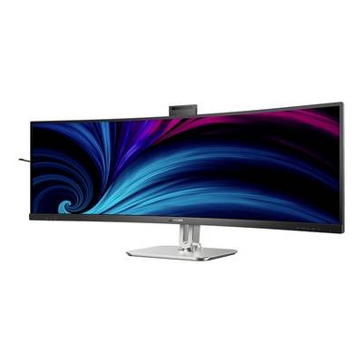 Un écran d'ordinateur ultra-large et incurvé avec des vagues vibrantes en tons de bleu et de rose sur l'écran.