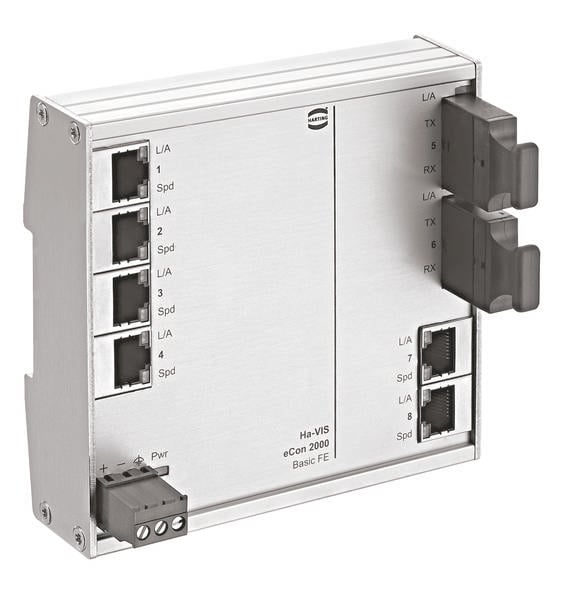 Un commutateur réseau argenté avec plusieurs ports Ethernet et des voyants LED. Des ports supplémentaires pour les connexions sont situés sur la droite.