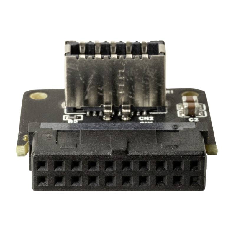 La carte d'E/S du module de calcul Raspberry Pi présente un connecteur noir en bas et des broches argentées en haut.