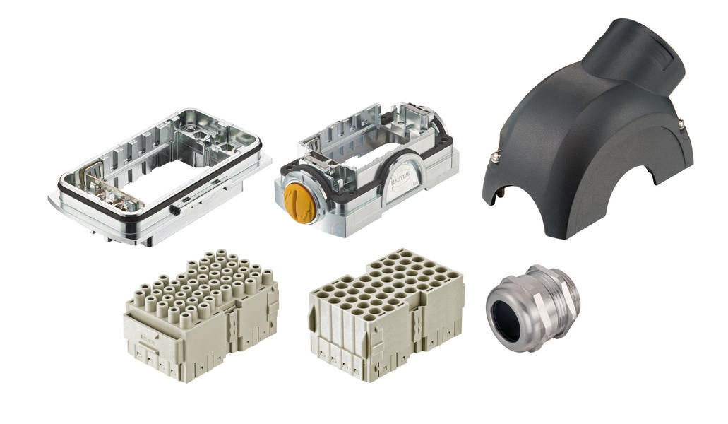 Plusieurs connecteurs : bride métallique, boîtier en plastique, 2 modules de connexion de grande taille avec de nombreux contacts, adaptateur coudé et vis de fixation métallique.
