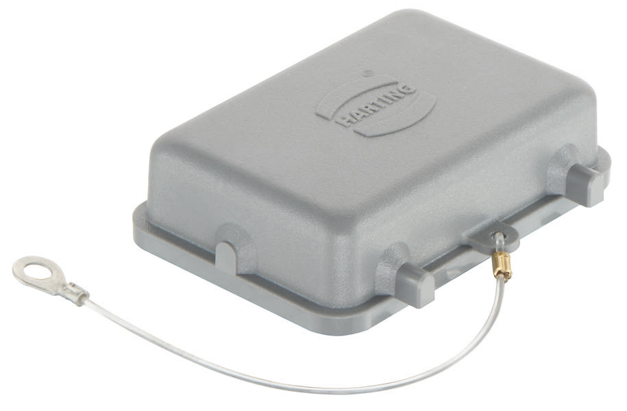 Boîtier rectangulaire gris en plastique avec une boucle métallique et un câble y étant attaché, sert de couvercle pour les connexions électriques.