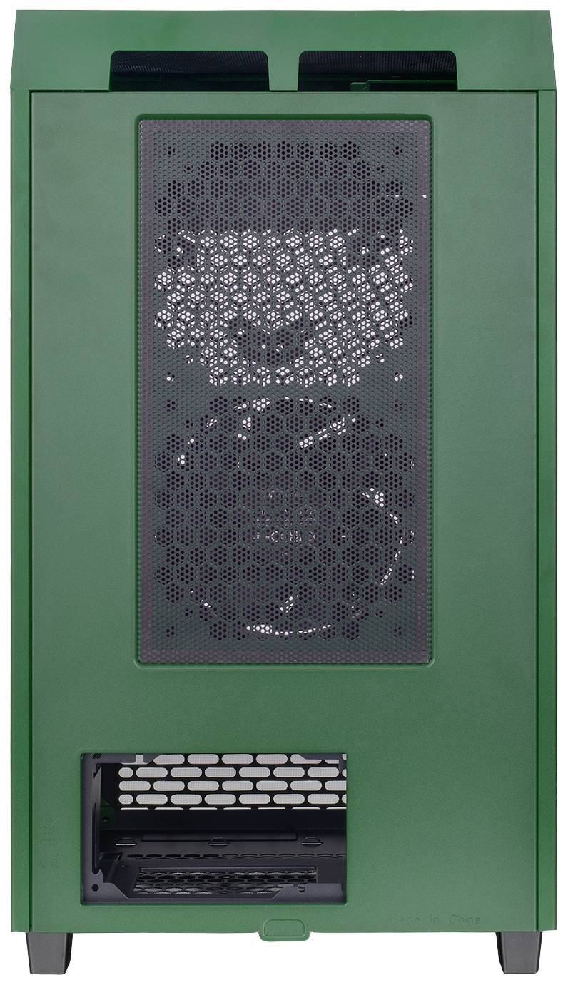 Appareil de chauffage vert de forme rectangulaire avec une grille de protection en haut et une entrée d'air en bas, sur des pieds sombres.