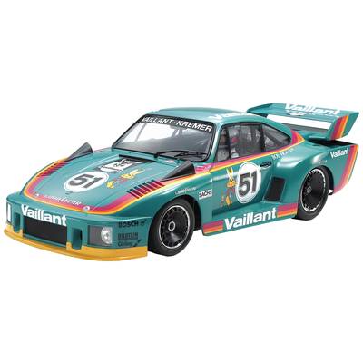Modèle réduit d'une voiture de course à l'échelle avec un design Vaillant turquoise, portant le numéro 51 et des bandes colorées.
