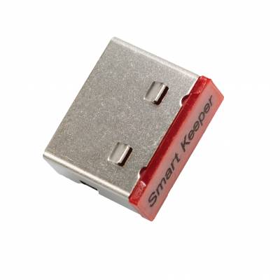 Une prise USB argentée avec une protection en plastique rouge, sur laquelle est inscrit 'Smart Keeper'.