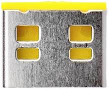 Bloc métallique avec quatre ouvertures rectangulaires, deux en haut et deux en bas. Bords marqués en jaune.