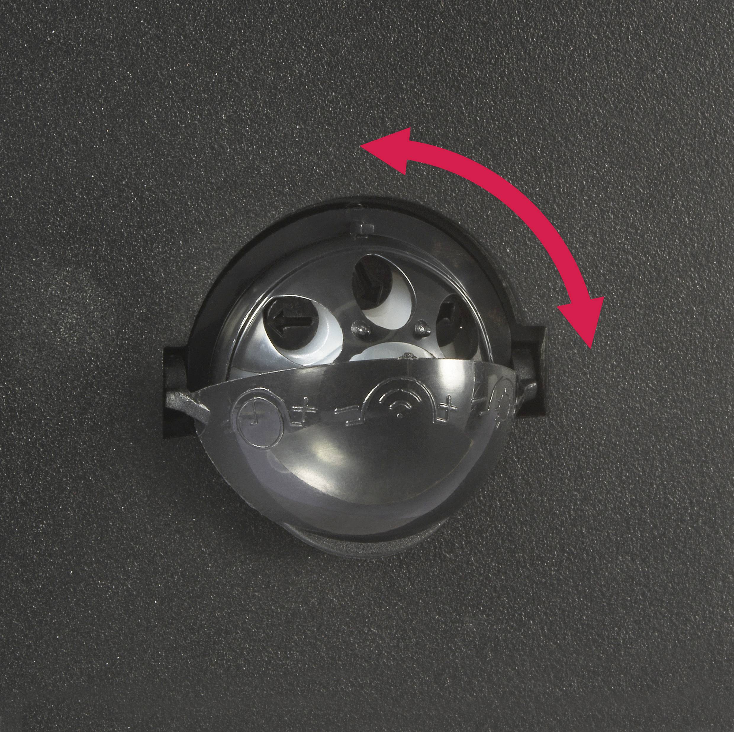 Une roue de sélection noire avec une double flèche rouge indiquant un mouvement de rotation.