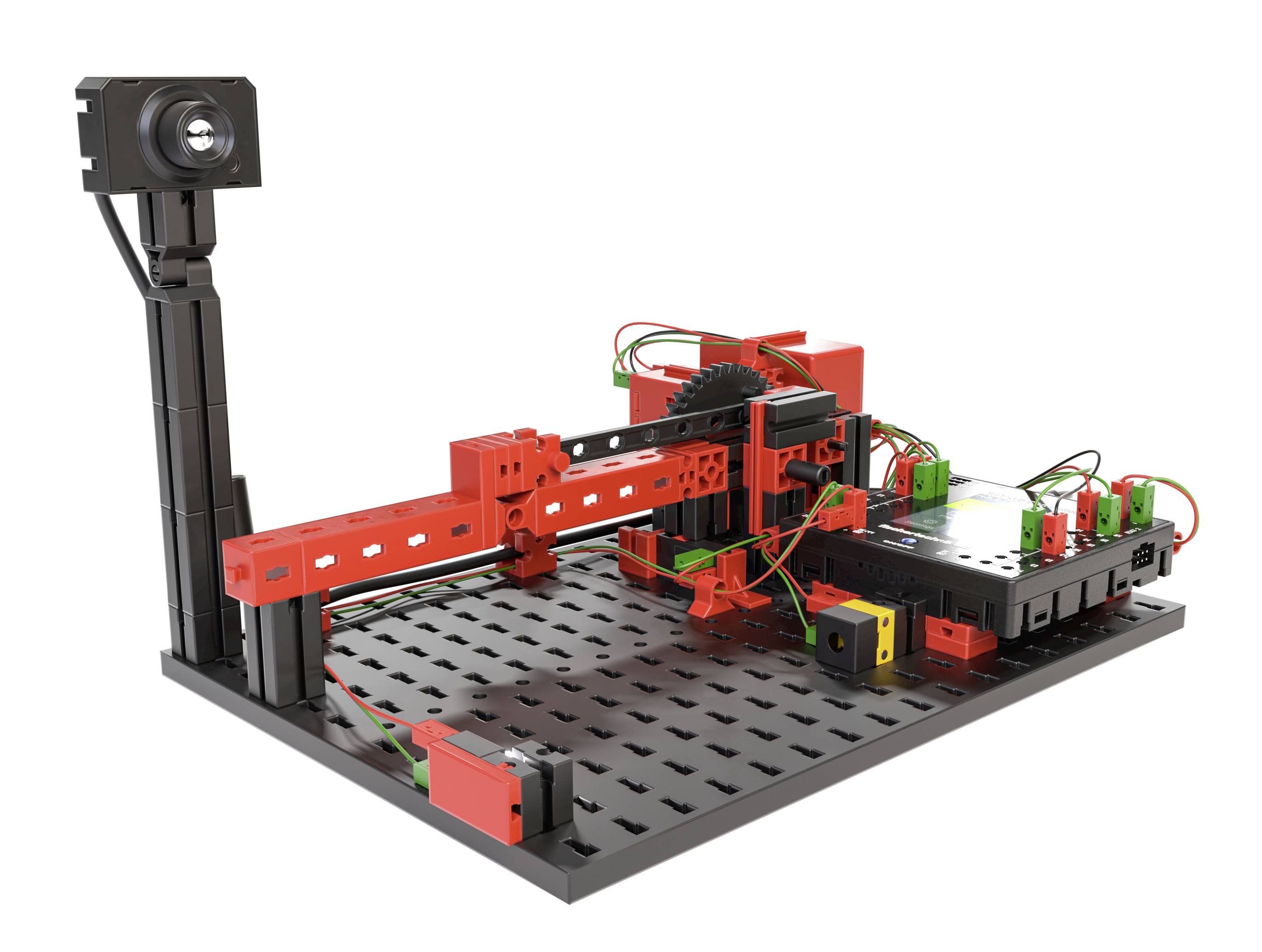 Un imprimante 3D de modélisme en plastique rouge et noir, avec différents câbles sur une base perforée.