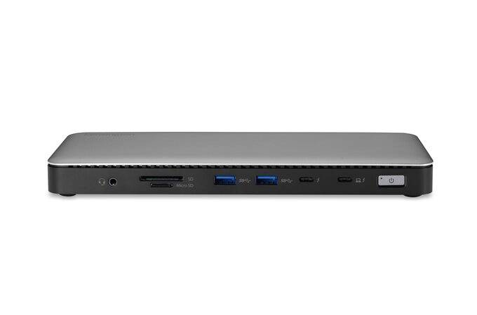 Un appareil électronique fin et gris avec plusieurs ports sur la façade, dont USB, HDMI et des ports audio.